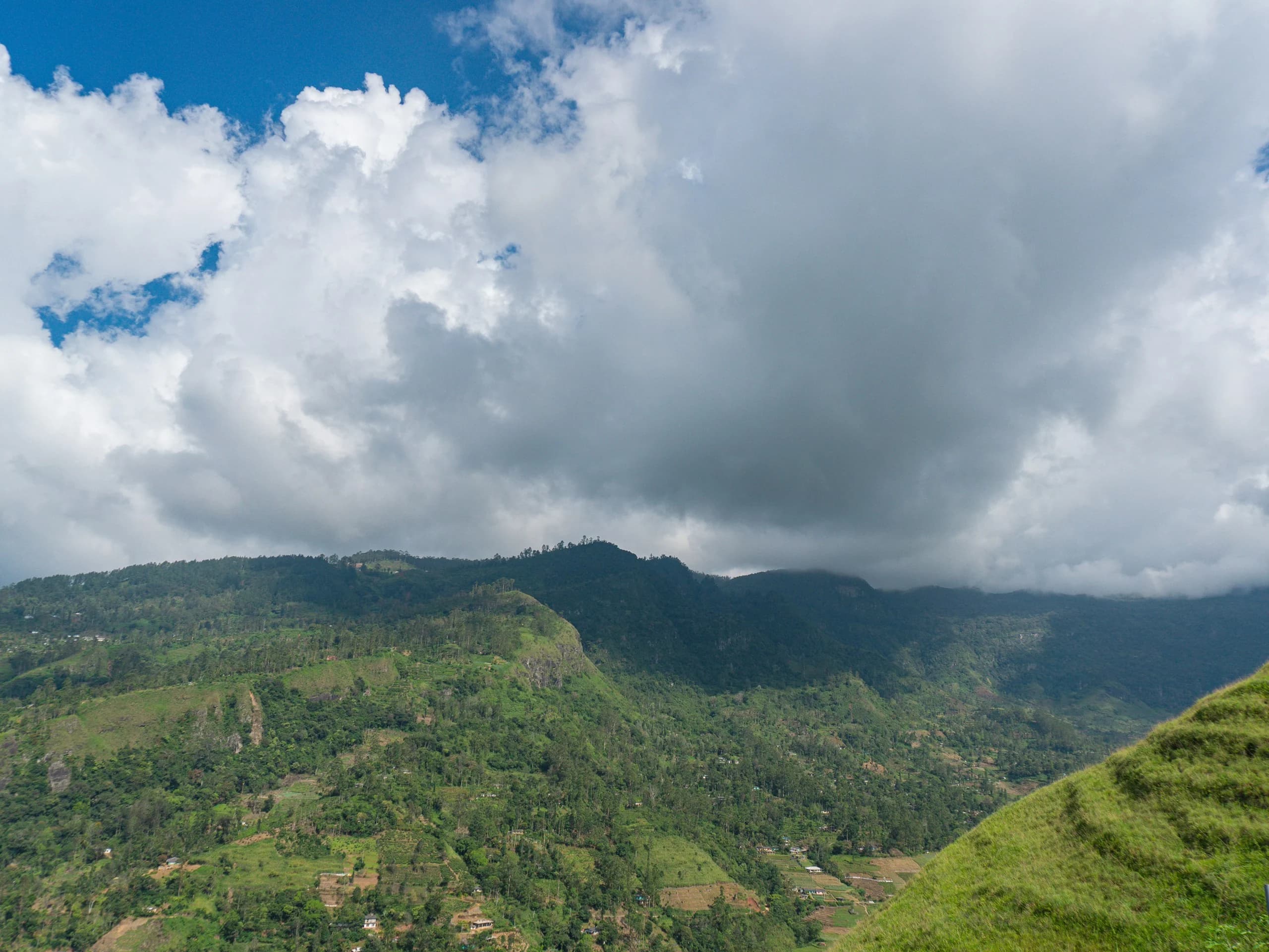 Clouds drifting over the green highlands of Sri Lanka